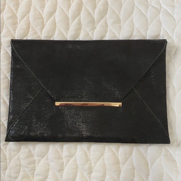 BCBGMaxAzria Handbags - Black Snake Print BCBGMAXAZRIA Envelope Clutch